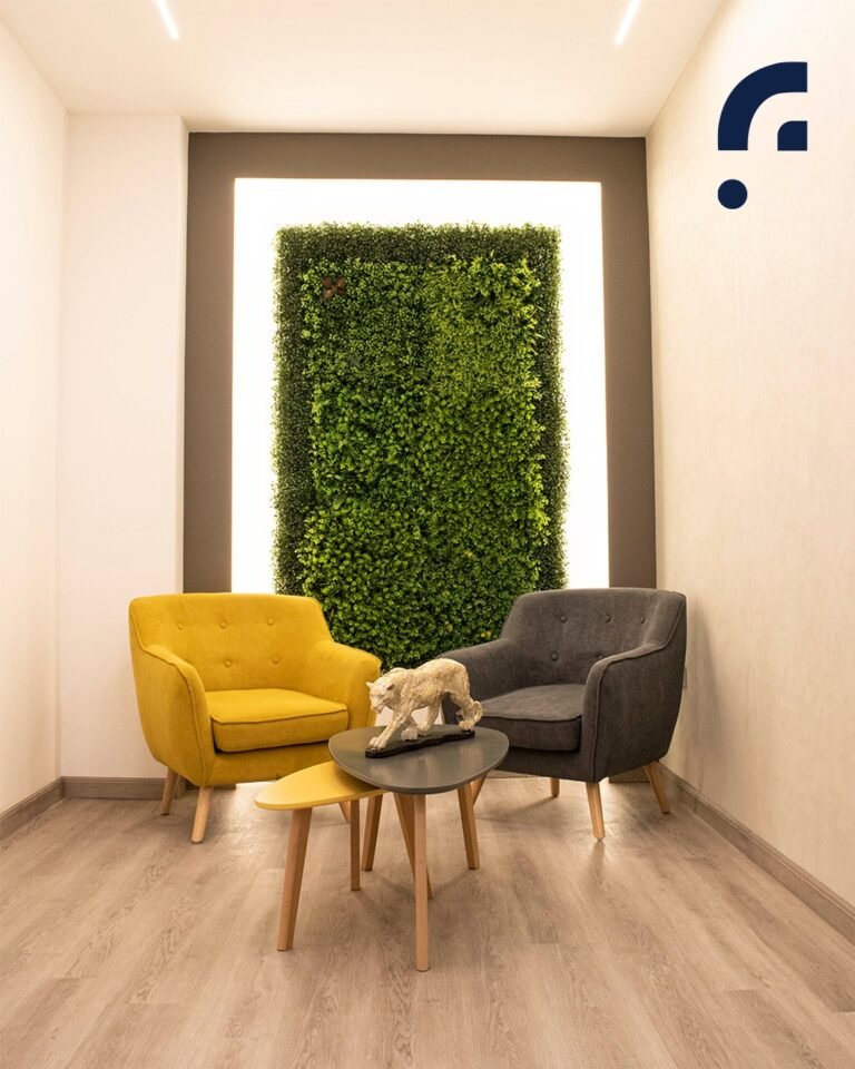 A space that soothes—this lounge corner pairs warm tones and plush seating with a vibrant green