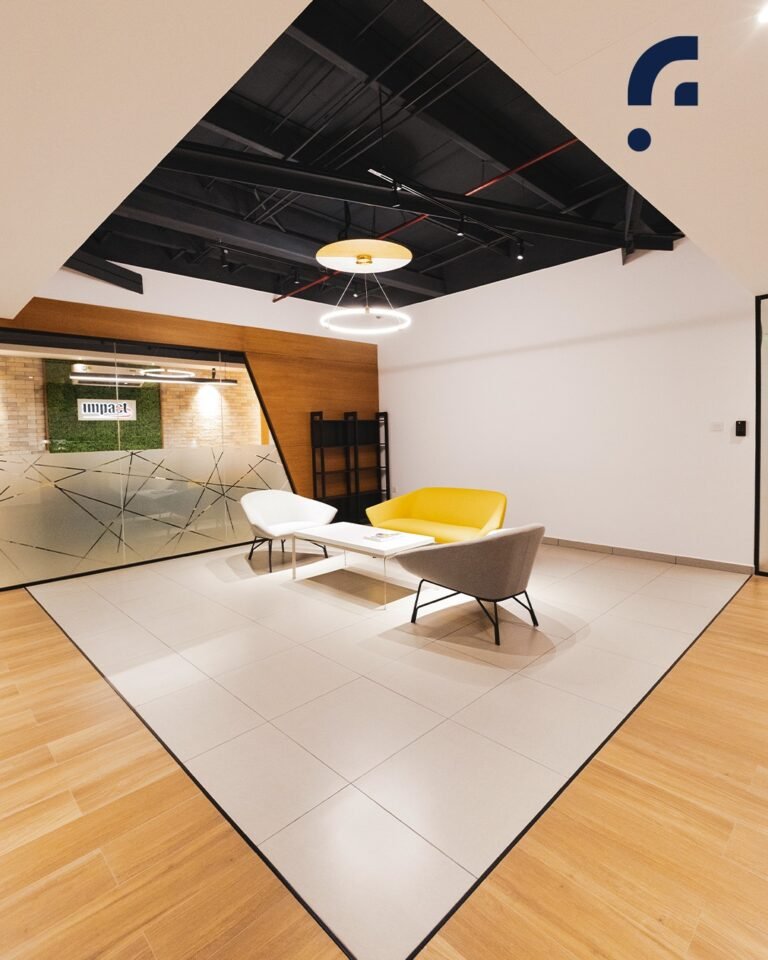 This discussion nook at Impact blends comfort with character—featuring a playful mix of seating, (1)